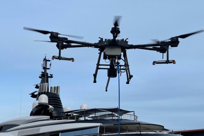 Drone cleaning a luxury yacht with precision, eco-friendly methods – Apex Drone Cleaning
