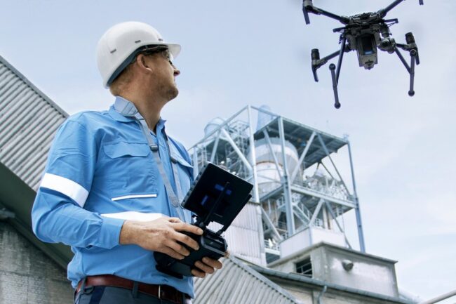 Drone inspection and cleaning services detecting facade damage with visual and thermal imaging